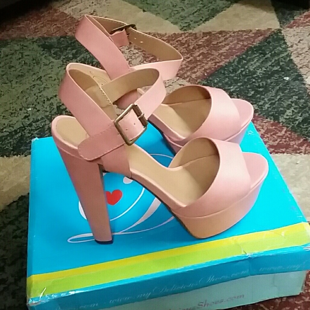 Nudish pink heels.